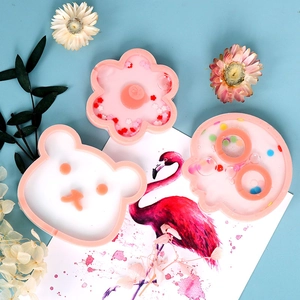 Moldes de resina epoxi DIY con formas de flor, oso y pulpo con purpurina rosa
