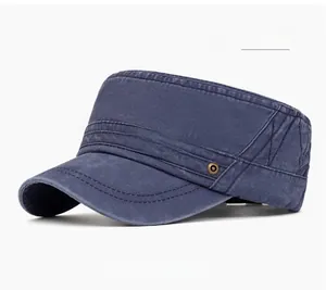 Detail of navy blue washed cotton flat top military cap with metal eyelets and stitching