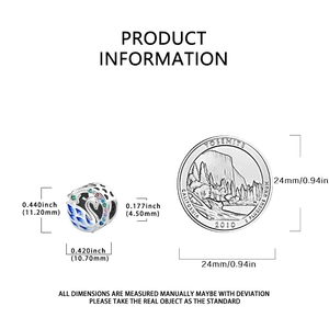 Detailed size chart showing silver swan pendant dimensions and a coin for scale