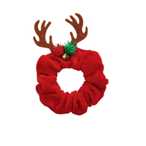 Chouchou de Noël avec bois de renne, velours rouge, clochettes et pompons sur fond blanc