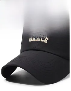 Macro detail of GRACE embroidery and textured grid fabric on a black baseball cap