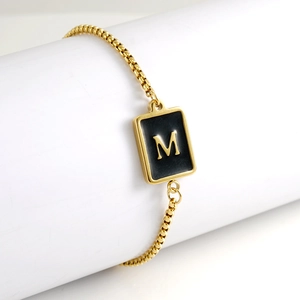 Adjustable 18K gold plated stainless steel bracelet with square letter M enamel charm