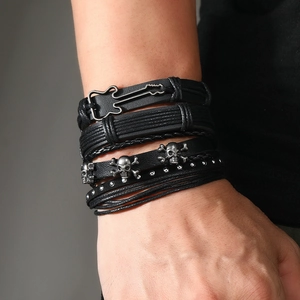 Men's multi-layer leather bracelet set with retro guitar and skull charms in punk style
