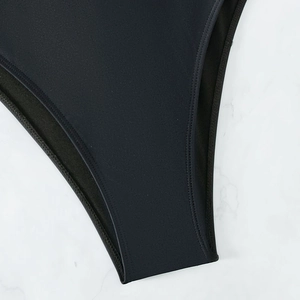 Close-up of black swimsuit bottom featuring reinforced double-needle stitching and fabric