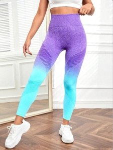 Detail of high waist seamless gradient yoga pants with breathable knit texture