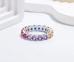 Detailed macro view of 925 silver rainbow eternity ring with colorful 5A zircon stones