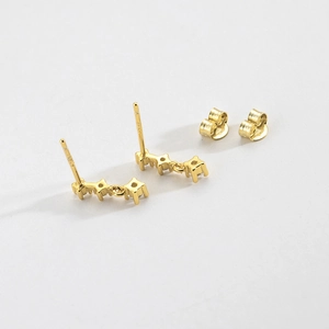 Elegant gold S925 sterling silver stud earrings with sparkling cubic zirconia stones
