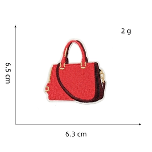 Detailed embroidery patch of red handbag with dimensions 6.5cm x 6.3cm and 2g weight