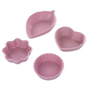 Pink wheat straw seasoning dishes in leaf, heart, flower, and round shapes set of four