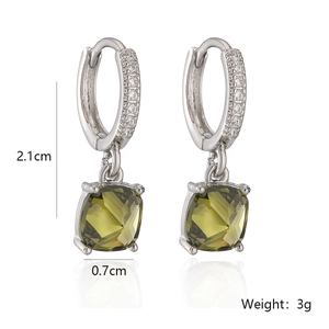 Detail shot of green zircon drop earrings with size and weight specs on white background