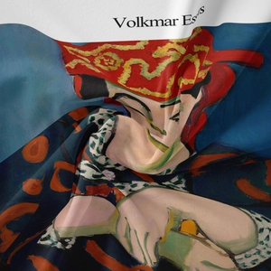 Close-up of bohemian wall tapestry showing artistic silk fabric texture and abstract print