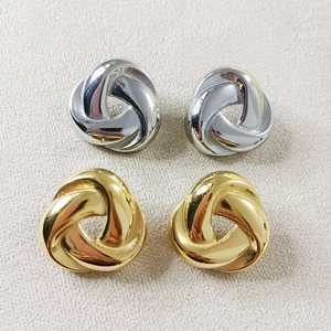 Polished chunky twisted triangle hoop earrings in gold and silver stainless steel finish