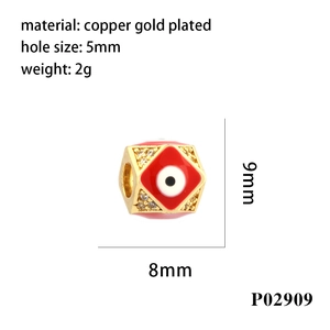 Macro view of a 9x8mm copper gold-plated evil eye bead with micro-pave cubic zirconia