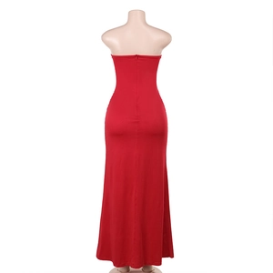 Close-up of the back zipper and slimming cut on this elegant red strapless long dress