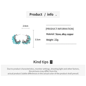 Detail view of turquoise C-shaped earrings with dimensions 2.4cm width and 3.5cm height
