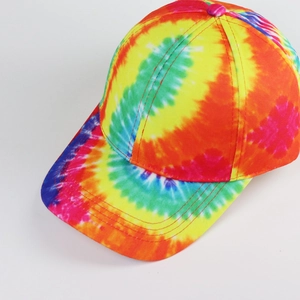 Detail view of colorful rainbow tie-dye baseball cap with premium stitched panels