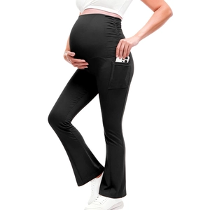 High waist maternity flare yoga pants in black with side pockets and belly support