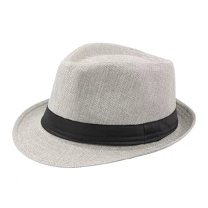 Detail of light grey fedora hat featuring breathable woven texture and black ribbon band