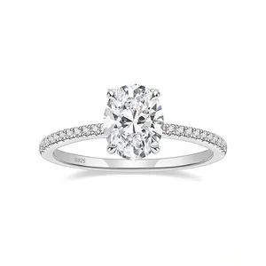 Detailed view of sterling silver oval cut solitaire ring with pavé diamond setting