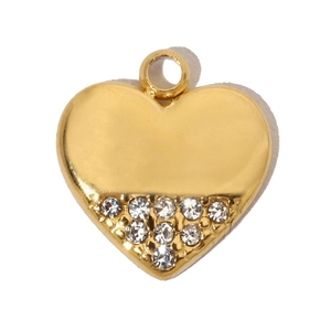 Detailed view of vintage gold heart pendant with zircon inlay and top hanging loop