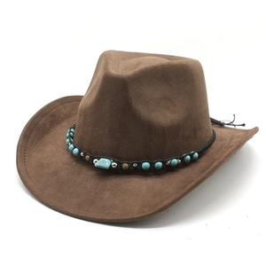 Brown suede felt western cowboy hat with turquoise bead decorative band on white background