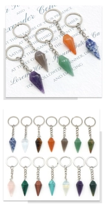 Various conical natural crystal stone keychains including amethyst and tiger eye
