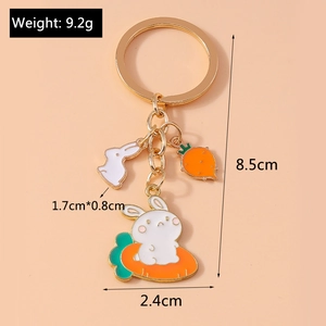 Cartoon white bunny and carrot charms keychain with dimensions and weight specs