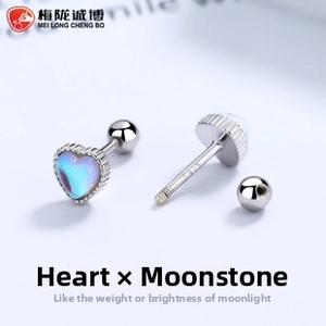 Close-up of heart-shaped moonstone stud earrings with S925 sterling silver screw back