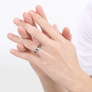 Minimalist silver stainless steel men's ring with geometric rhombic texture and polished finish