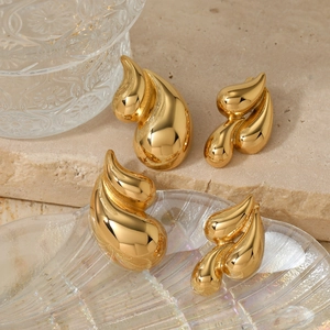 Double-layered gold stainless steel teardrop earrings with a polished geometric design