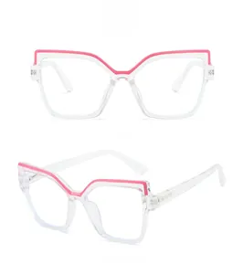 Front and side view of geometric cat-eye glasses with pink accents on clear frames