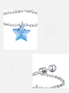 Detailed view of the S925 sterling silver star pendant with blue zircon on a fine chain
