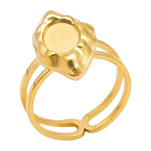 Detail of gold double-layer open ring with lava irregular design and circular base