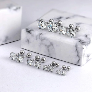 Six pairs of 3mm-8mm stainless steel stud earrings with white zircon on marble