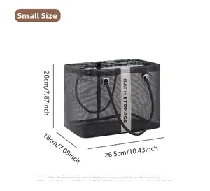Mesh bath storage bag with dual handles and size dimensions of 26.5x18x20 cm