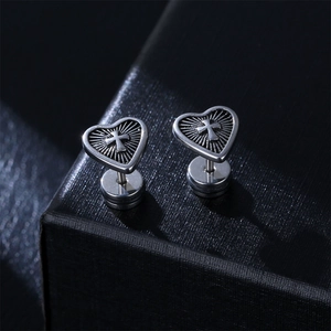 Gothic vintage silver heart stud earrings with embossed cross and screw back closure