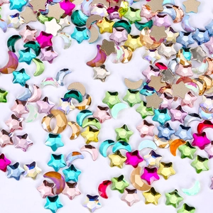 Colorful mix of star and moon shaped rhinestones for nail art and DIY decoration