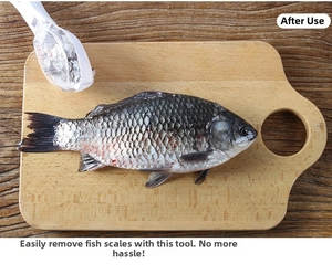 Close-up of a white plastic fish scaler with a clear lid used on a wooden board