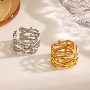18K gold plated and silver stainless steel crisscross rings with wavy textured design