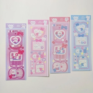 Detailed view of four colorful floro studio cartoon stickers with bear and rabbit motifs