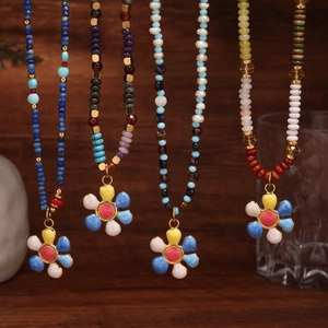 Handmade beaded necklaces with natural stones, freshwater pearls and flower charms