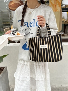 Striped canvas tote bag in black and yellow with large capacity for daily use