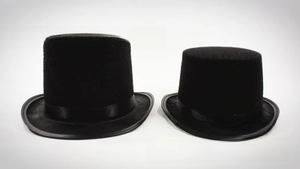 Detail showing two black felt top hats in different heights with satin ribbon bands
