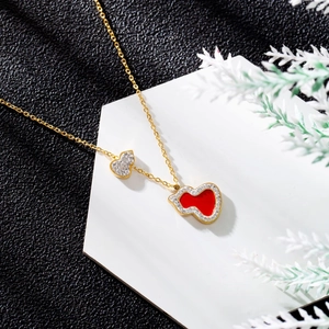 Titanium steel heart pendant necklace with red filling and crystals on white base