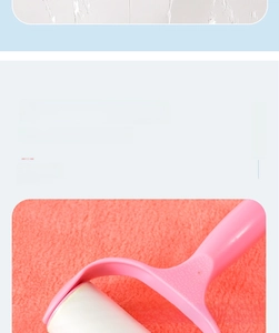 Detail view of pink lint roller for removing hair from clothes and sofa surfaces