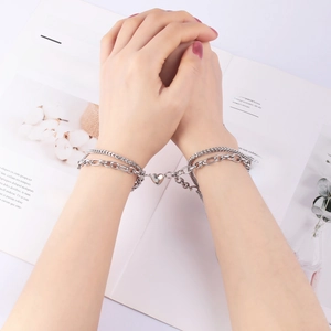 Double-layered stainless steel couple bracelets with magnetic heart charm in silver