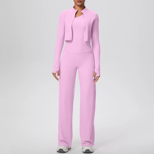 Detailed view of women's 3-piece pink yoga set with zipper jacket and wide-leg pants