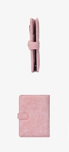 Detail showing side profile and back texture of pink leather passport holder wallet