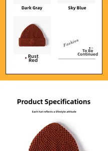 Detail view of winter knit beanies in dark grey, sky blue and rust red colors