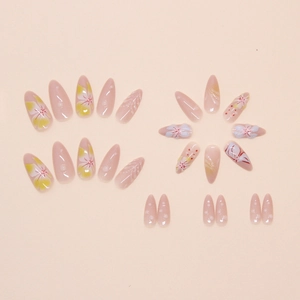 Set di 24 unghie finte a mandorla con motivi floreali 3D e base rosa nude